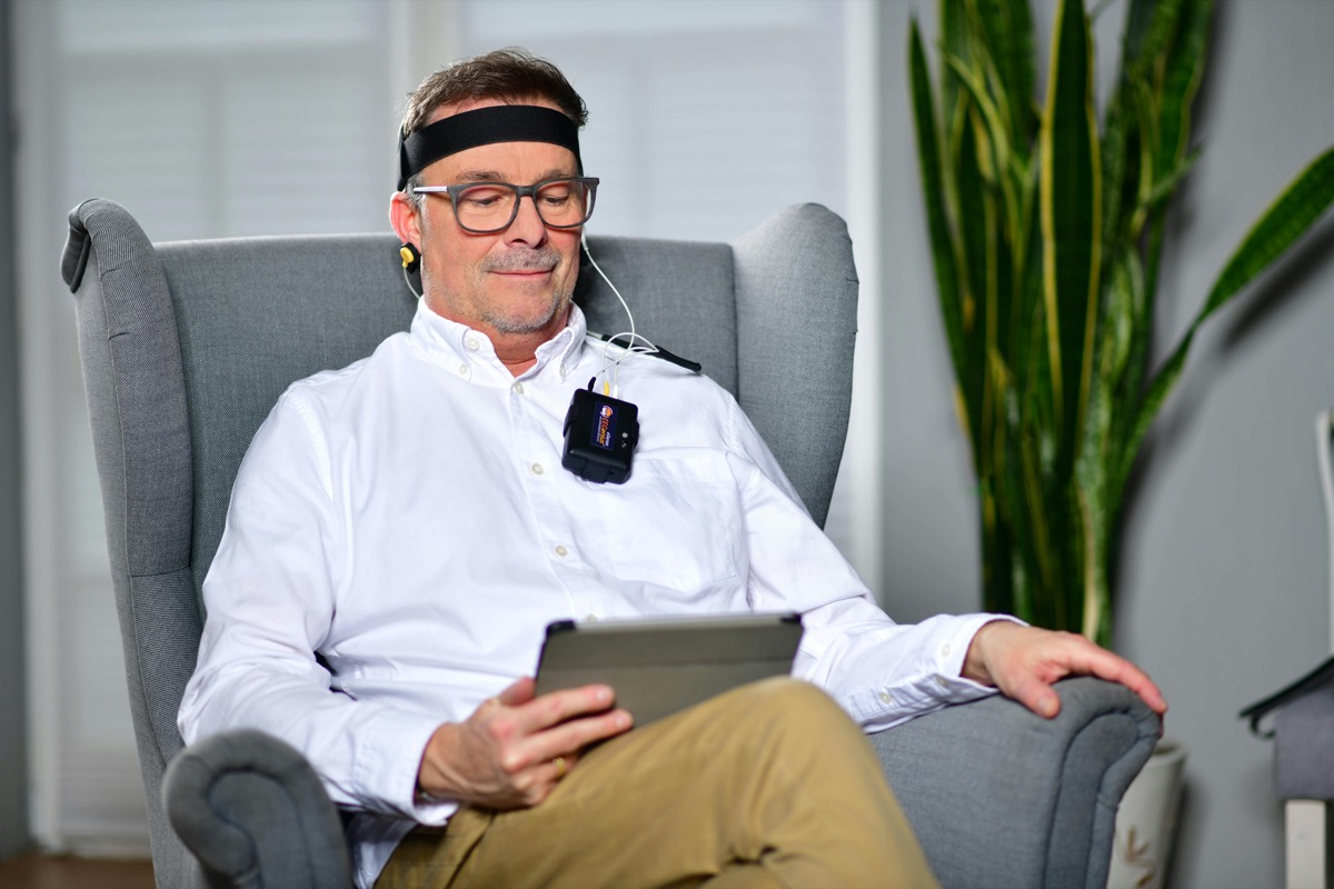 Man receiving neurofeedback brain training session with EEG sensors — neurofeedback therapy in Charlotte, NC